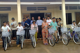 Xuan Loc Bishop Office presents bicycles and notebooks to poor students.